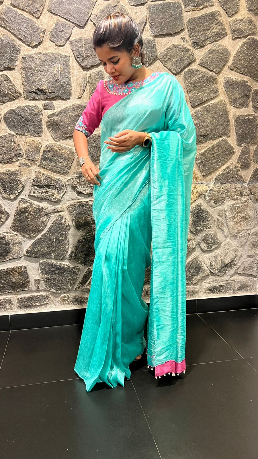 Soft blue tissue saree with pink hand embroidered blouse