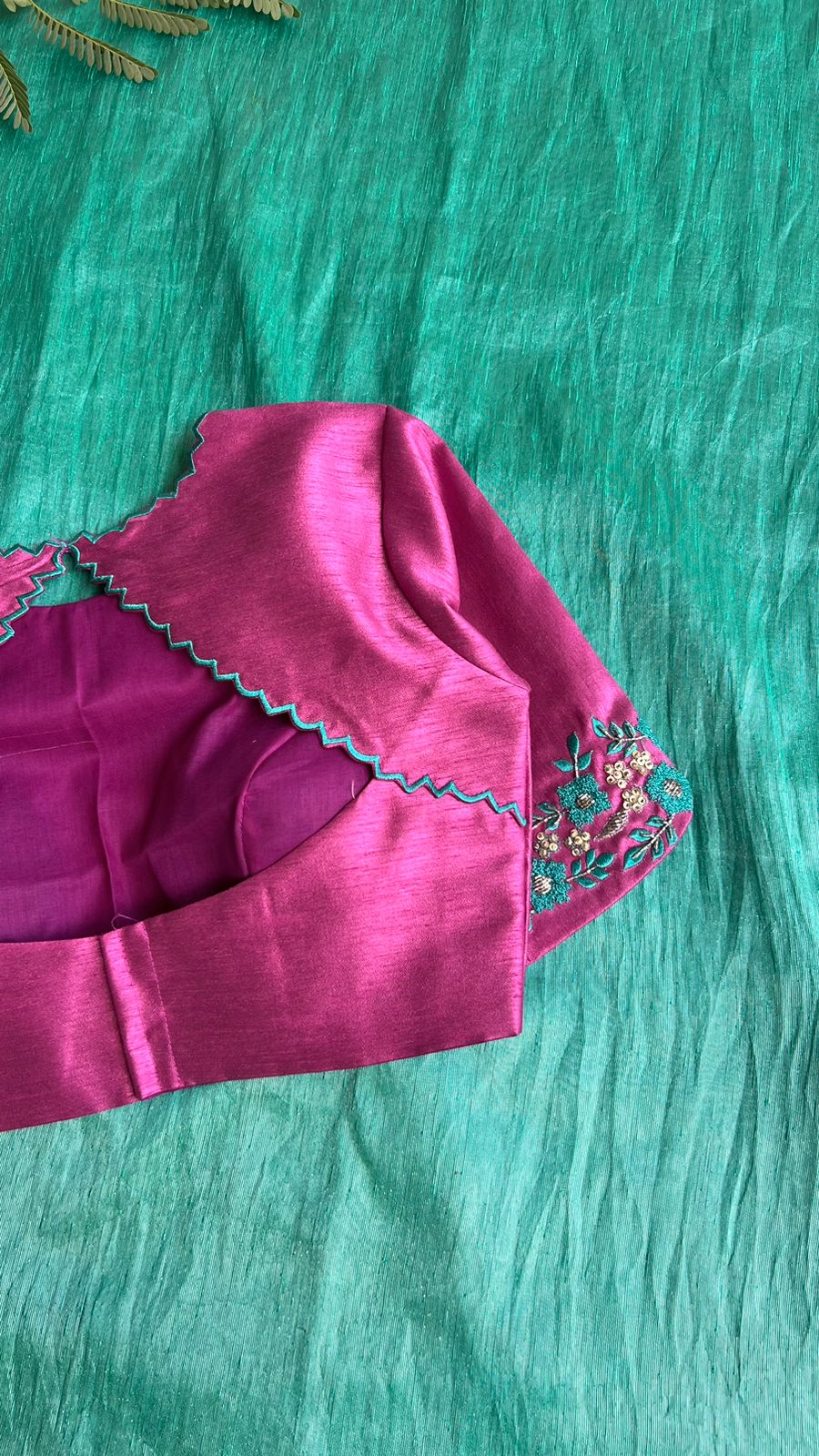 Soft blue tissue saree with pink hand embroidered blouse