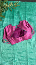 Soft blue tissue saree with pink hand embroidered blouse