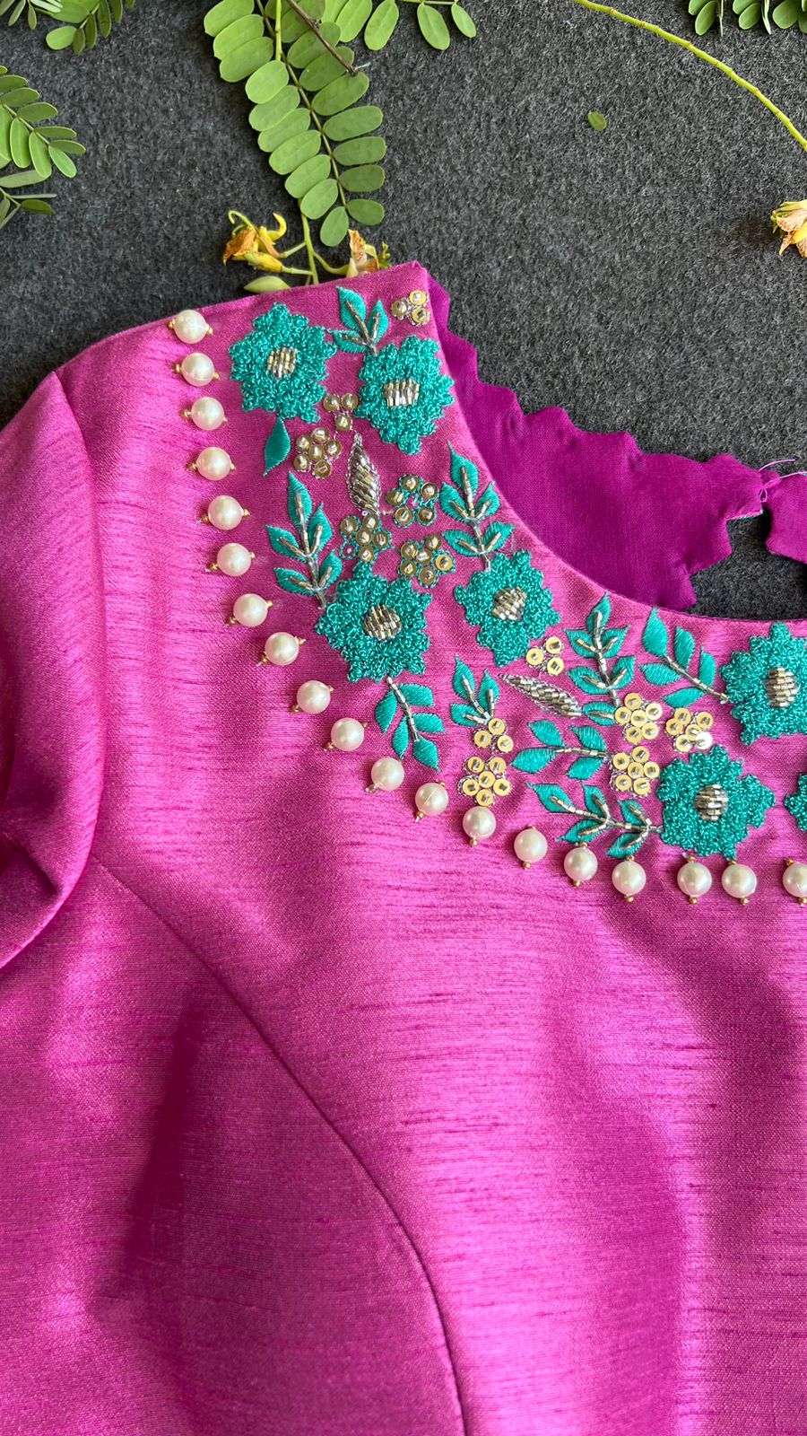 Soft blue tissue saree with pink hand embroidered blouse