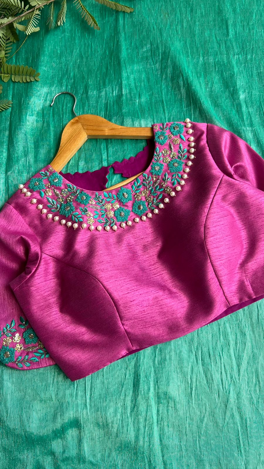 Soft blue tissue saree with pink hand embroidered blouse