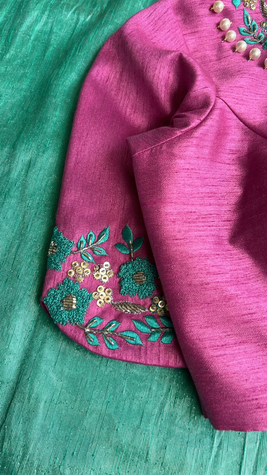 Soft blue tissue saree with pink hand embroidered blouse