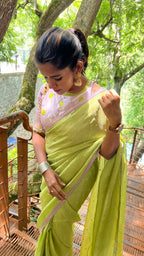 Green jute saree with lavender hand worked blouse