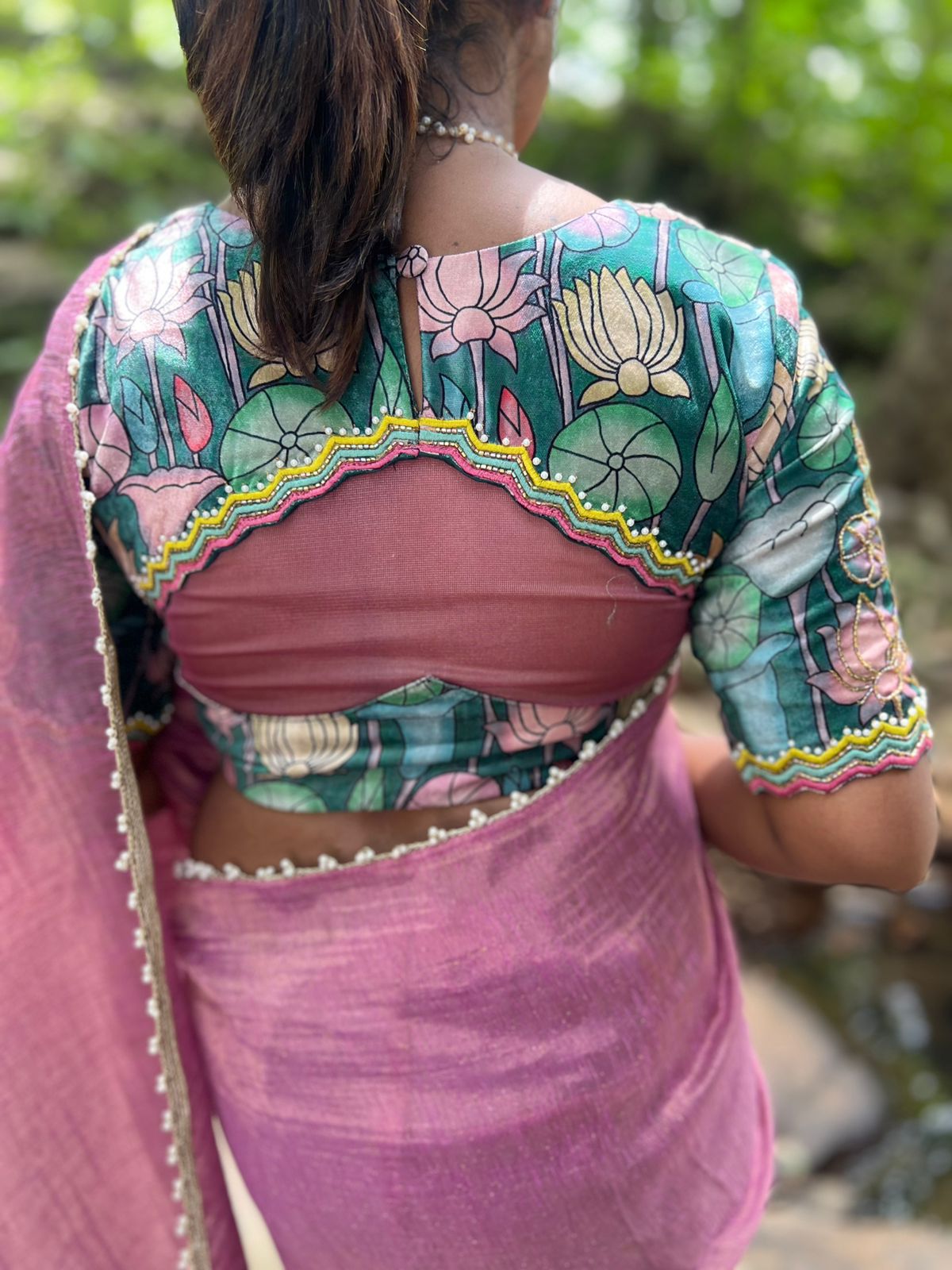 Pink tissue saree with floral velvet hand worked blouse