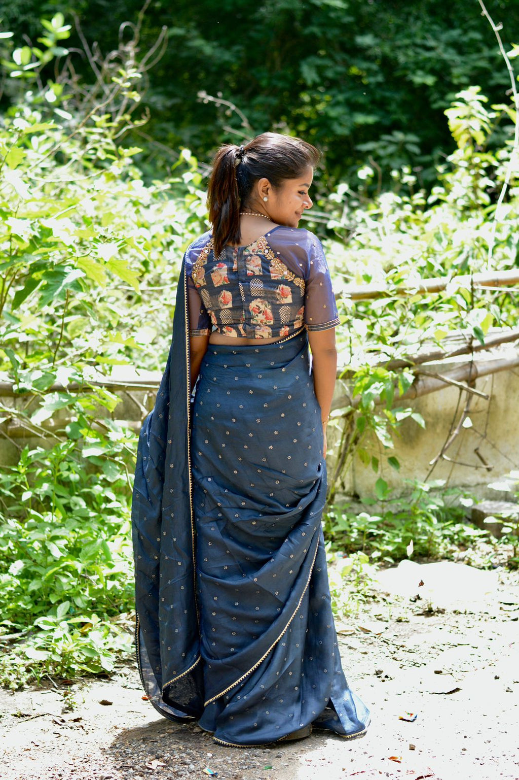 Navy blue jute saree with heavy hand worked blouse