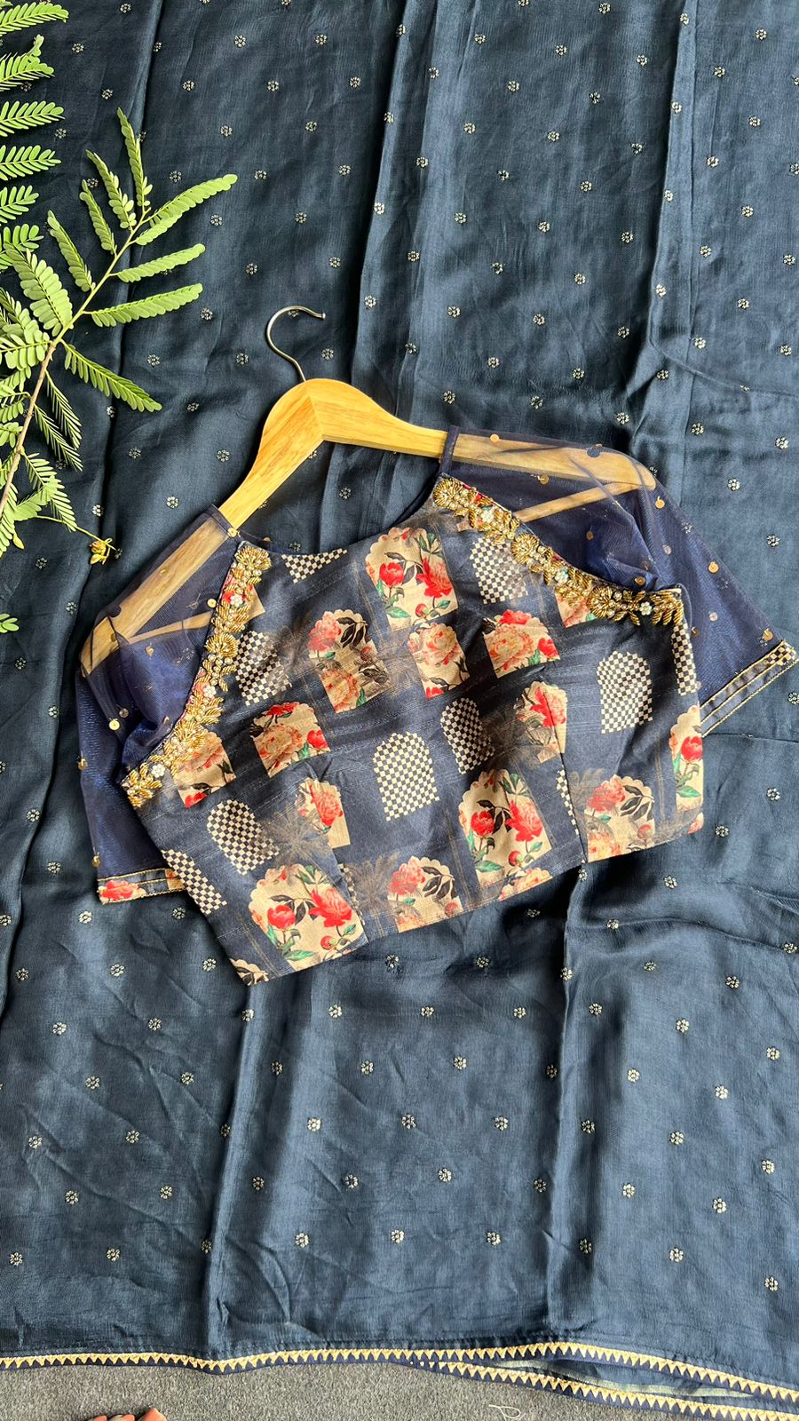 Navy blue jute saree with heavy hand worked blouse