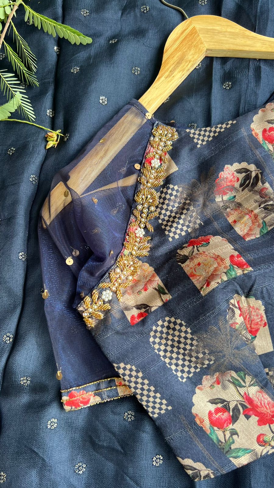 Navy blue jute saree with heavy hand worked blouse