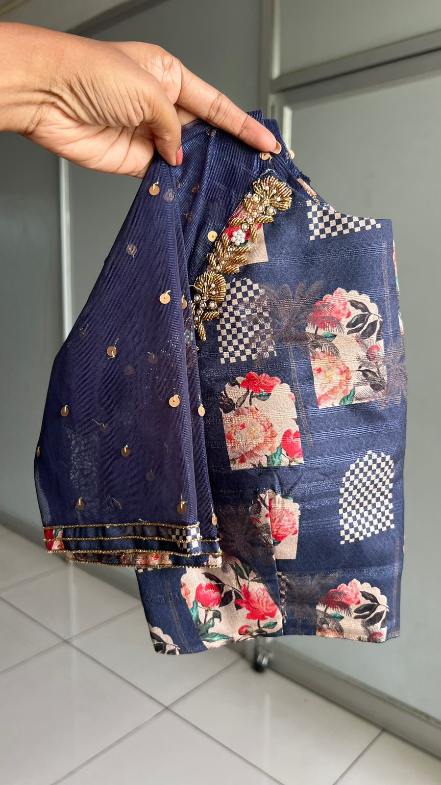 Navy blue jute saree with heavy hand worked blouse
