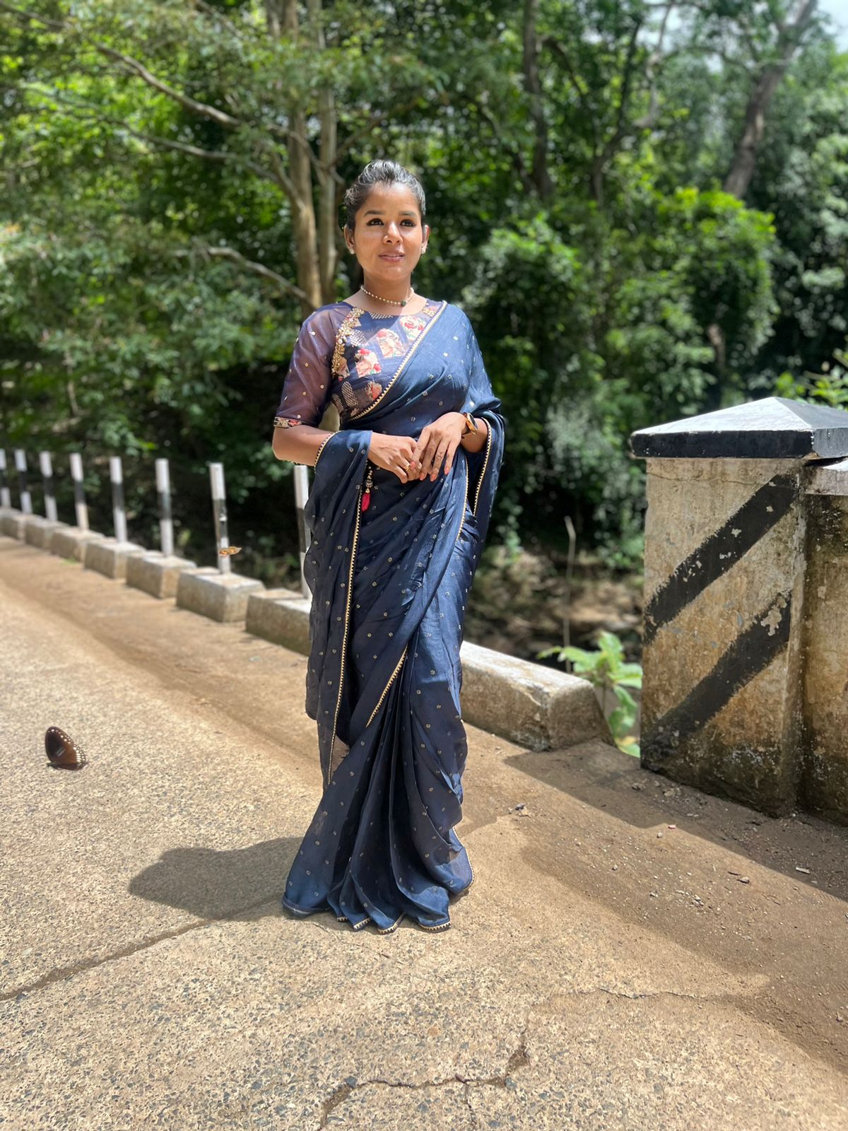Navy blue jute saree with heavy hand worked blouse