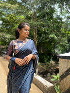 Navy blue jute saree with heavy hand worked blouse