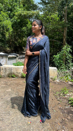 Navy blue jute saree with heavy hand worked blouse