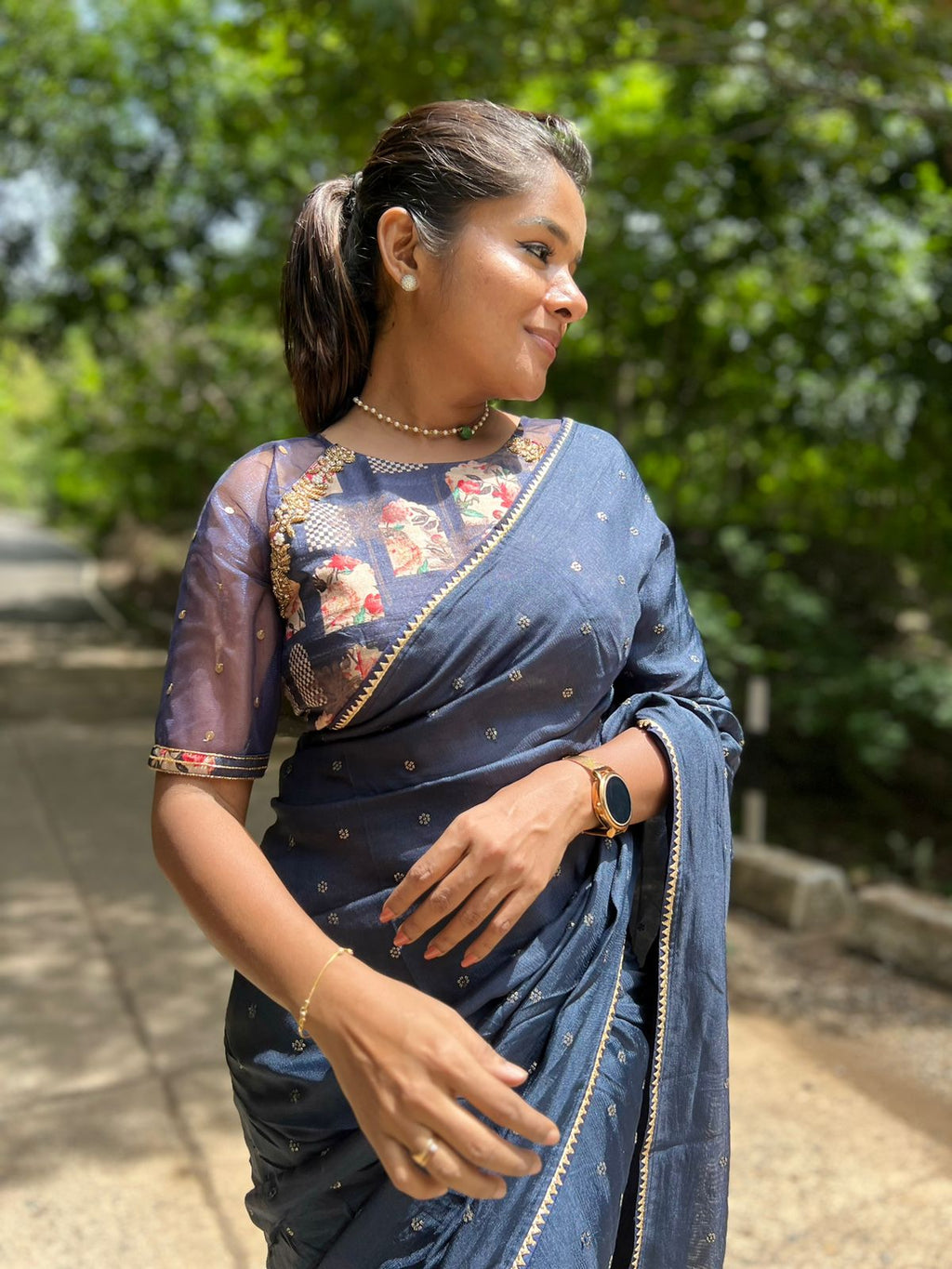 Navy blue jute saree with heavy hand worked blouse