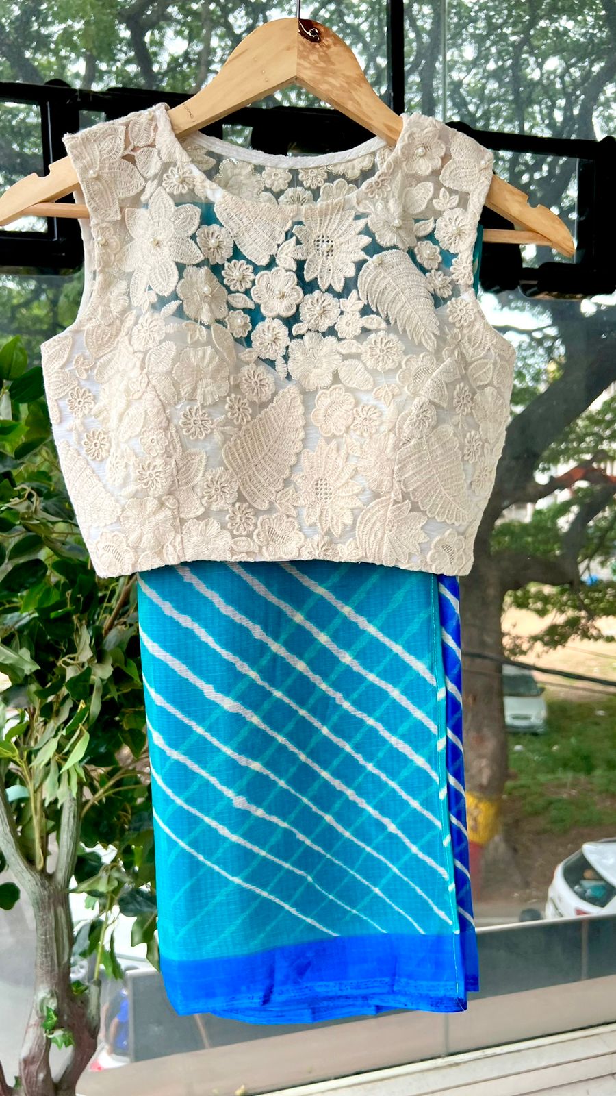 Blue chiffon stripped saree with embroidery blouse