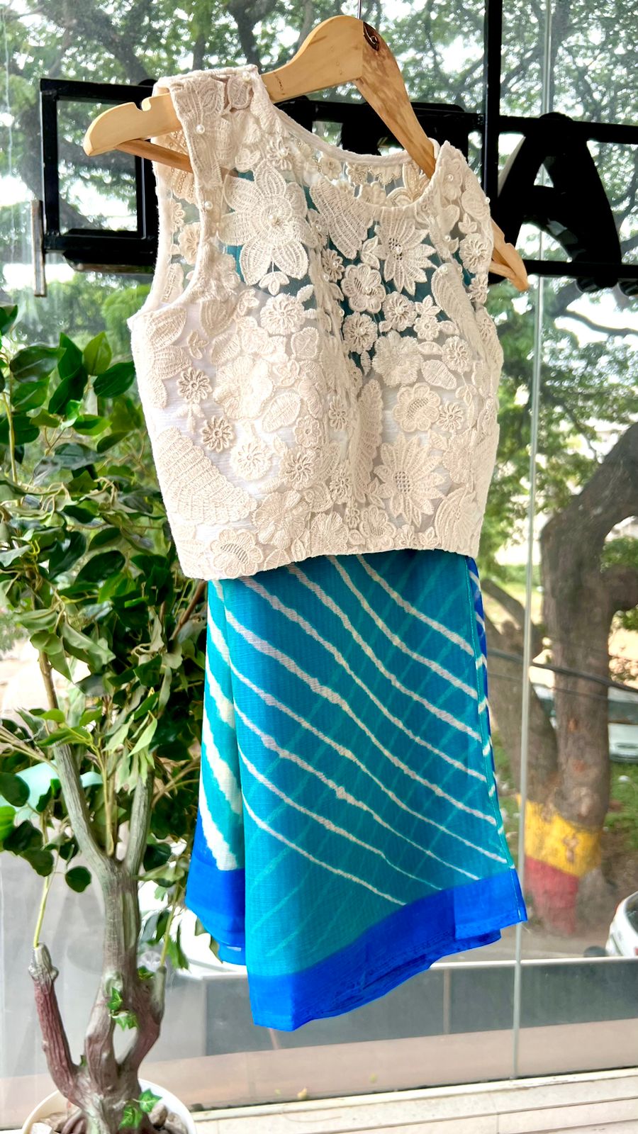 Blue chiffon stripped saree with embroidery blouse