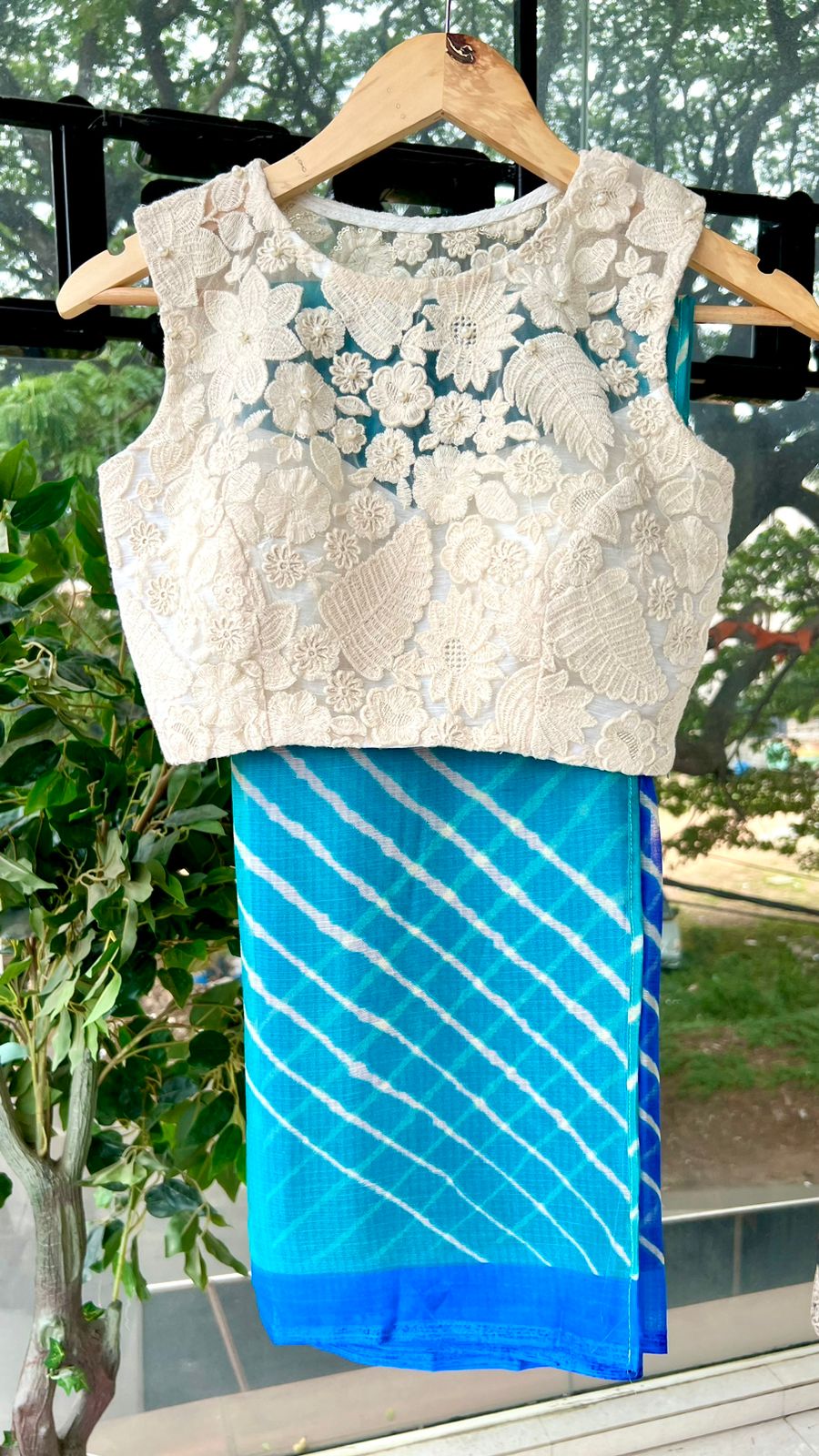 Blue chiffon stripped saree with embroidery blouse Threads