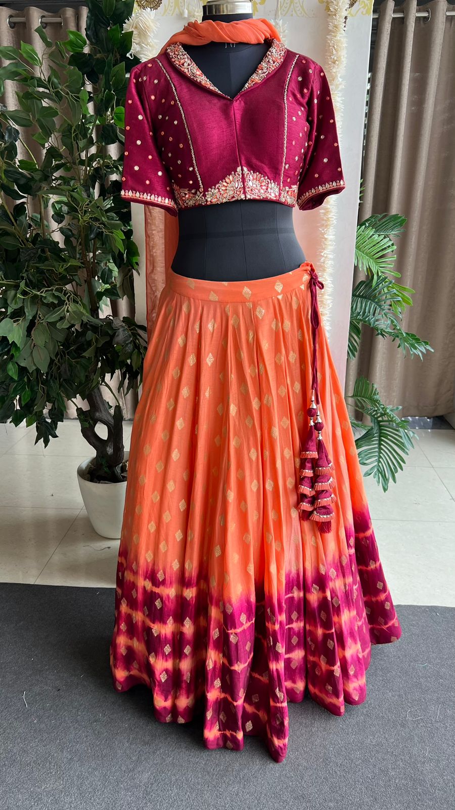 Orange & maroon banarasi hand painted & embroidered lehenga