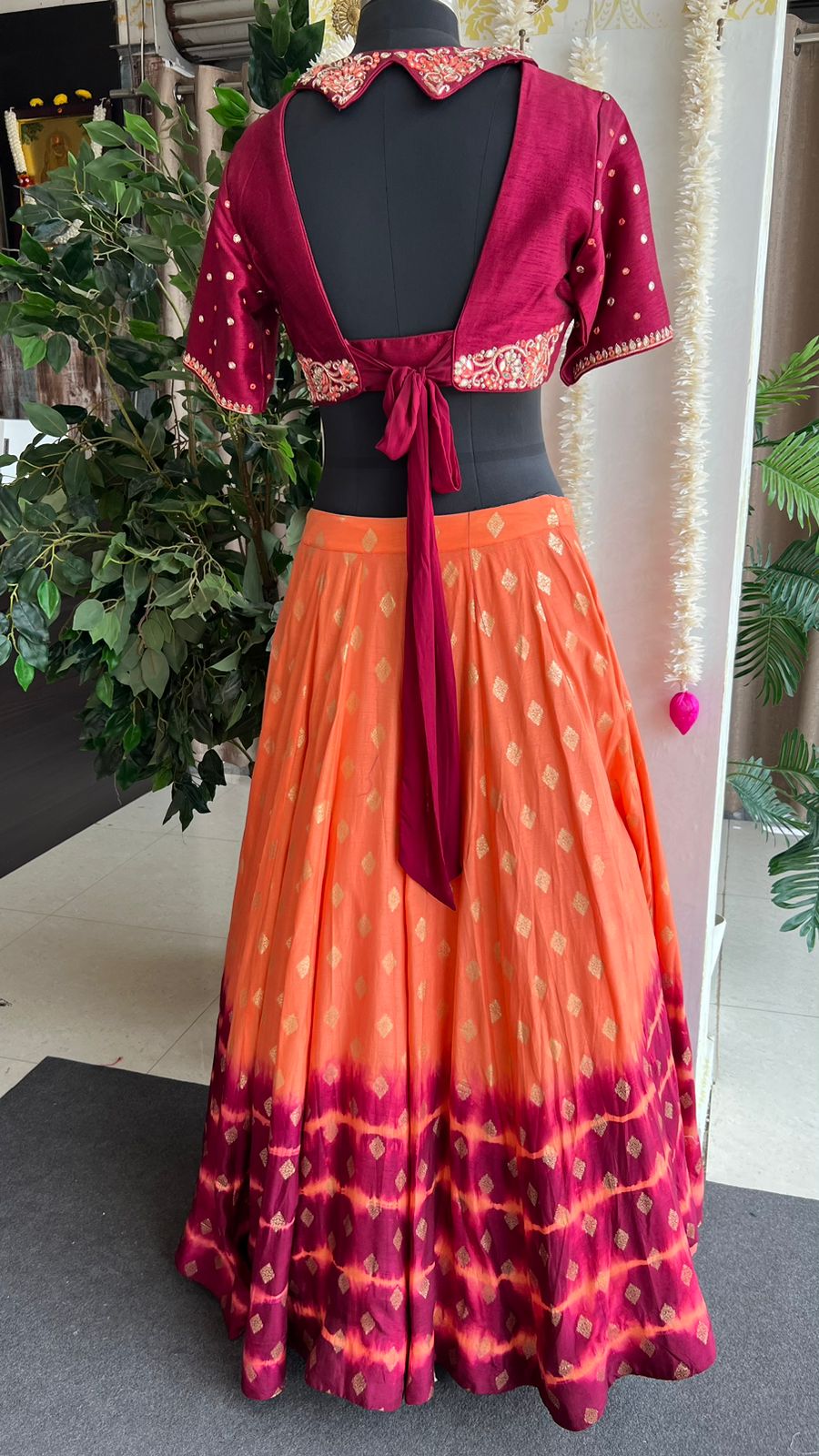 Orange & maroon banarasi hand painted & embroidered lehenga