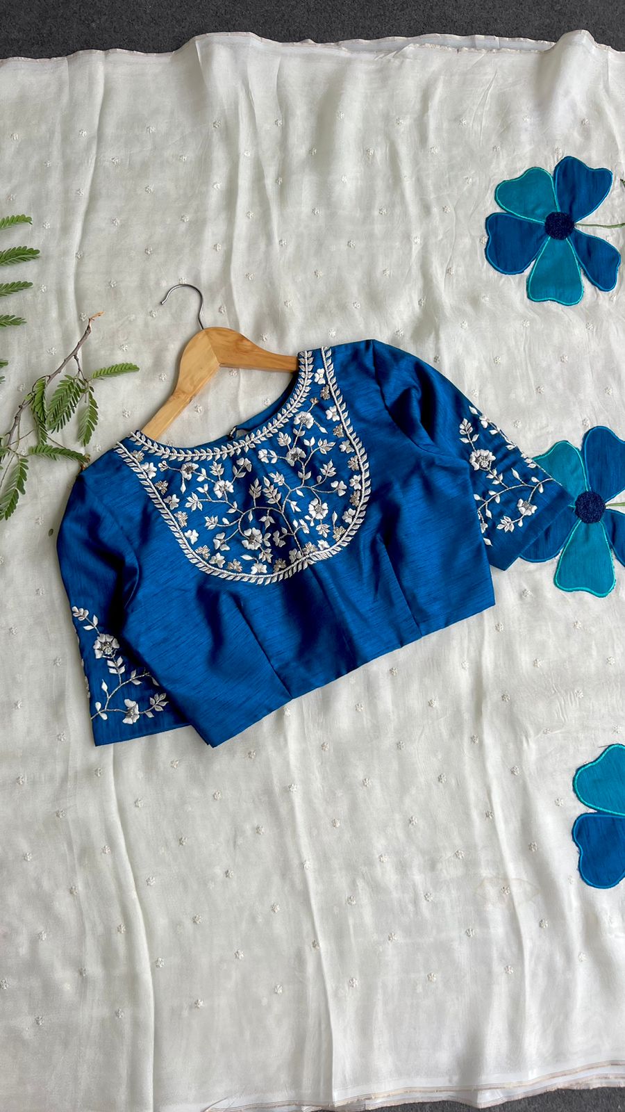 White jute saree with blue embroidery handmade blouse