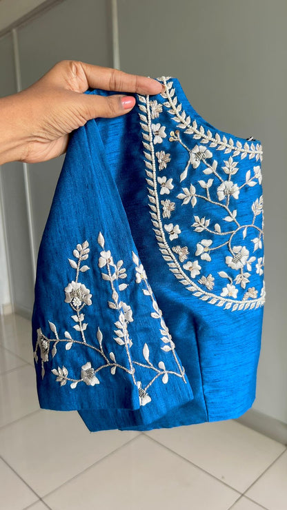 White jute saree with blue embroidery handmade blouse