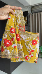 Red organza saree with cotton hand worked blouse