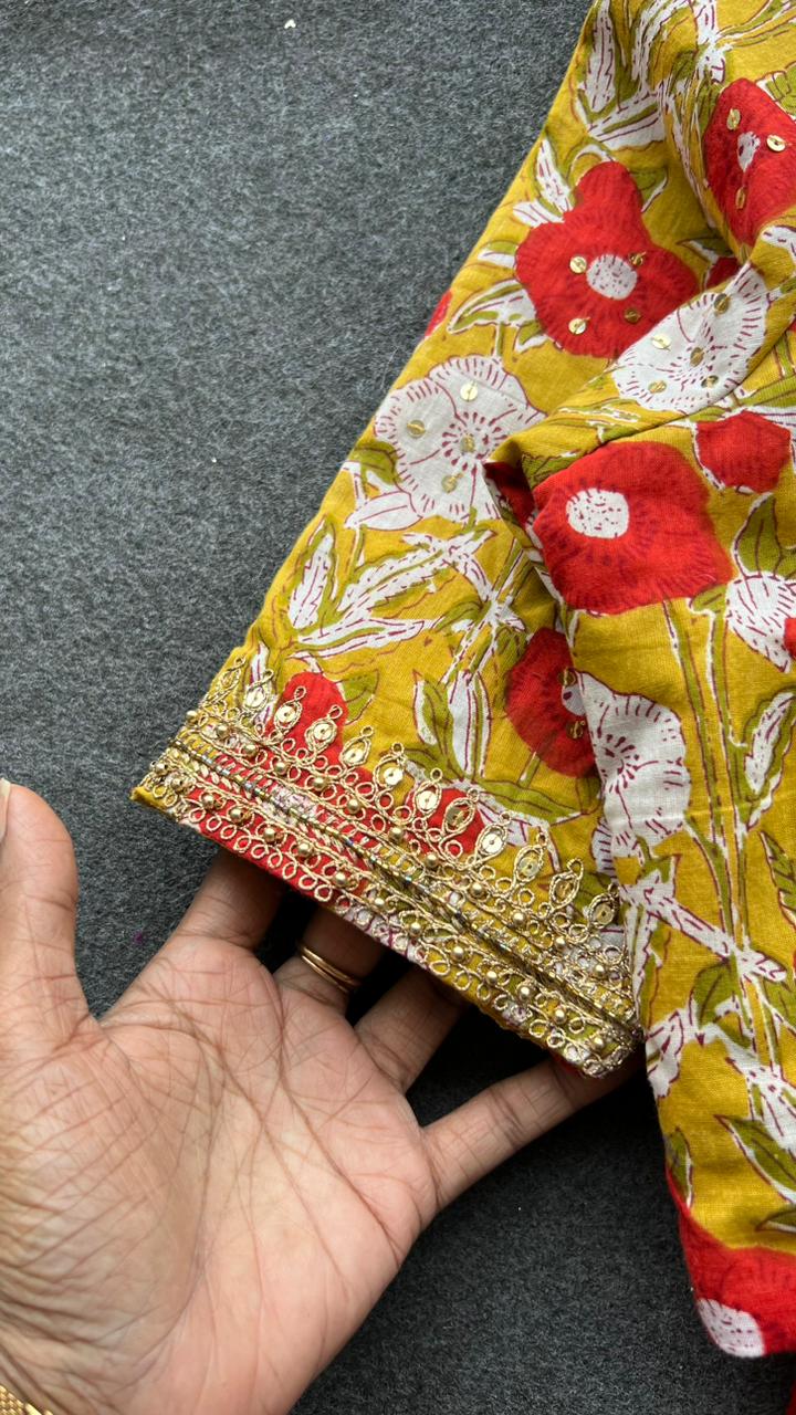 Red organza saree with cotton hand worked blouse