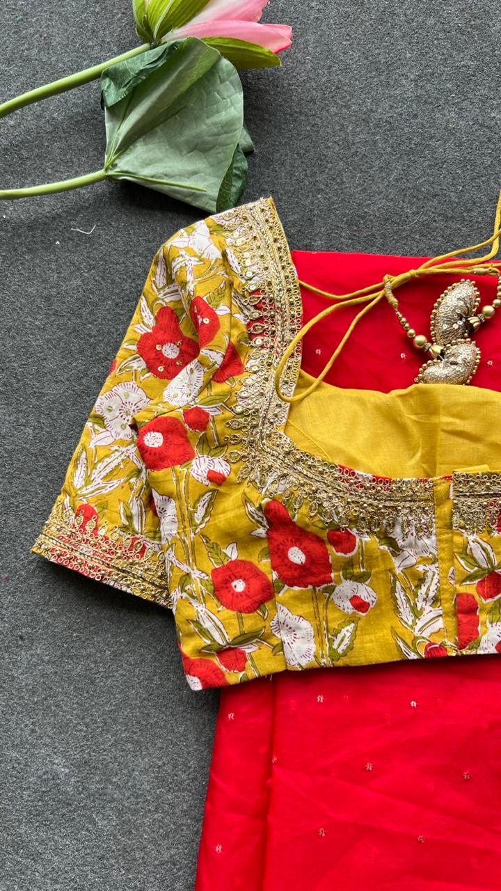 Red organza saree with cotton hand worked blouse