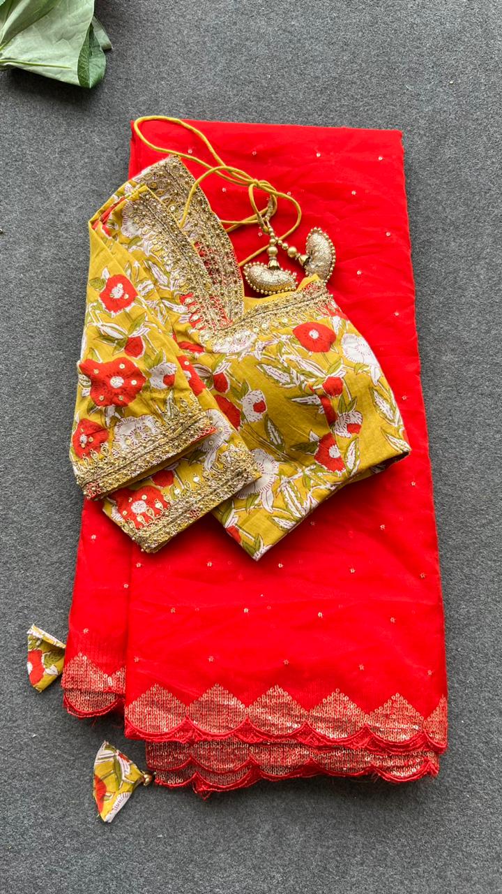 Red organza saree with cotton hand worked blouse