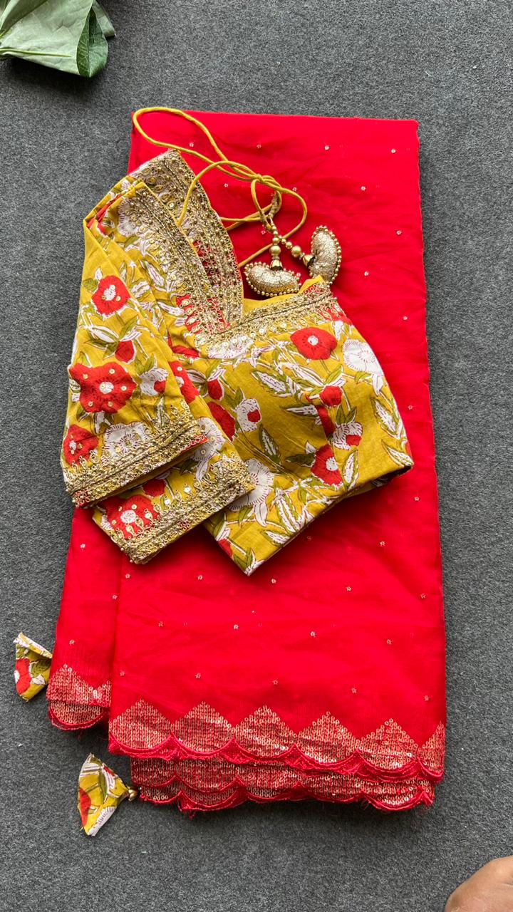 Red organza saree with cotton hand worked blouse