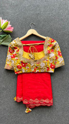 Red organza saree with cotton hand worked blouse