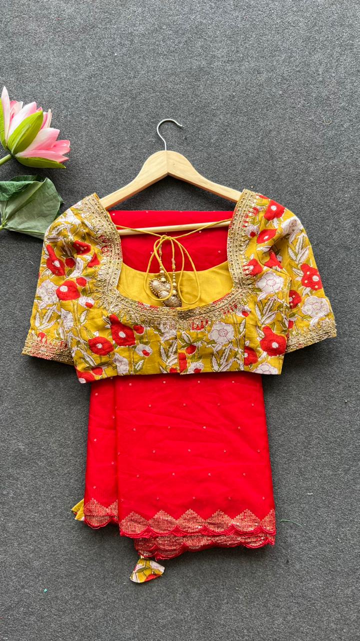 Red organza saree with cotton hand worked blouse