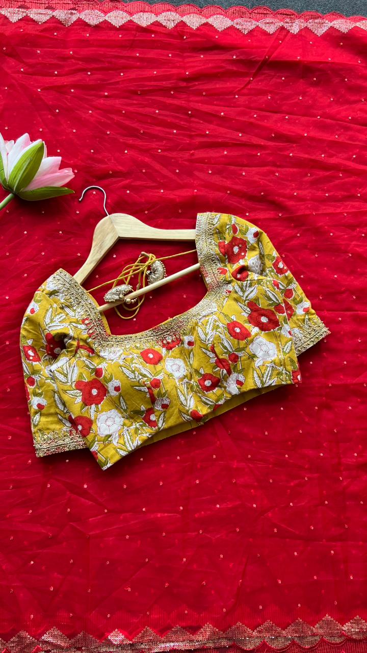 Red organza saree with cotton hand worked blouse