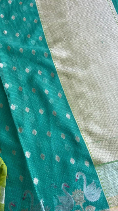 Sea green kota embroidery saree with parrot blouse