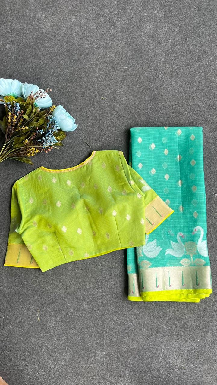 Sea green kota embroidery saree with parrot blouse
