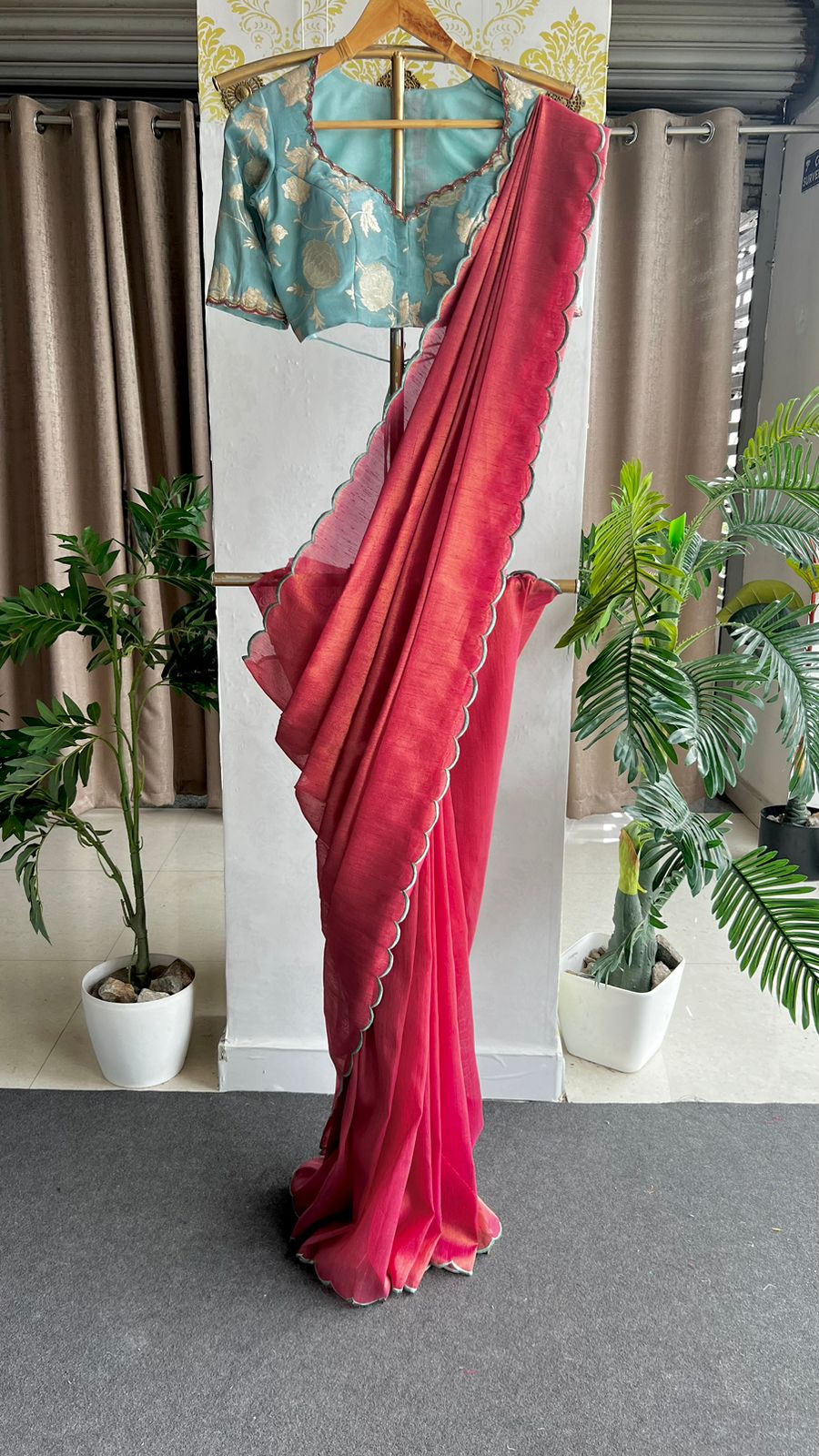 Pink soft tissue saree with blue hand worked blouse