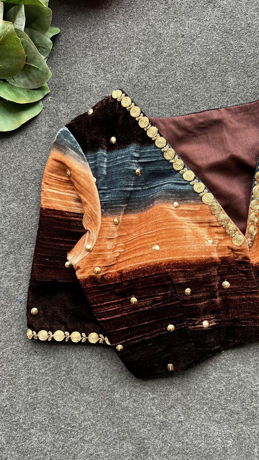 Blue organza saree with stripe velvet blouse