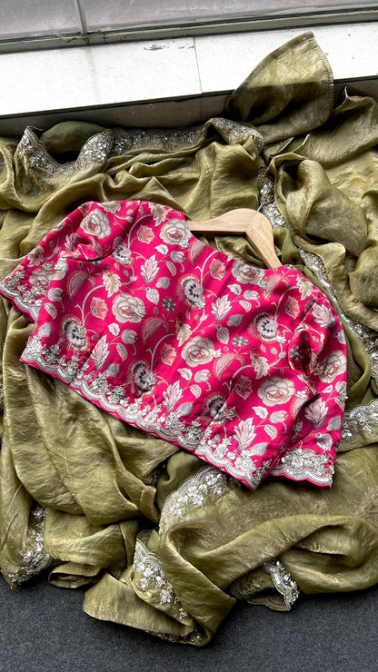 Green soft tissue saree with pink floral embroidered blouse