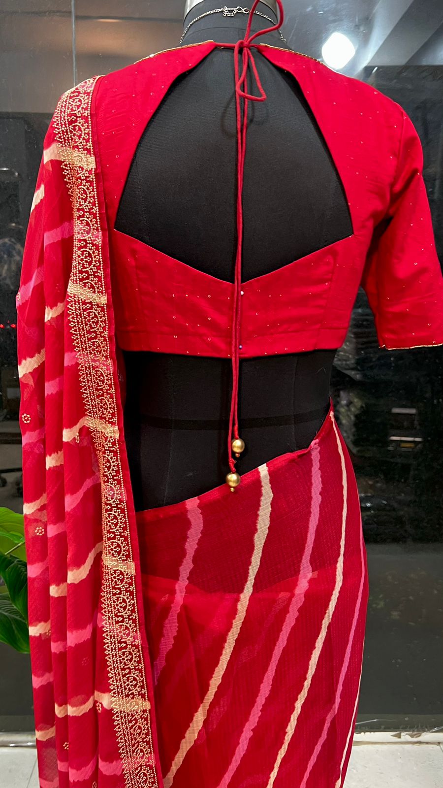 Red lehariya chiffon saree hand work blouse