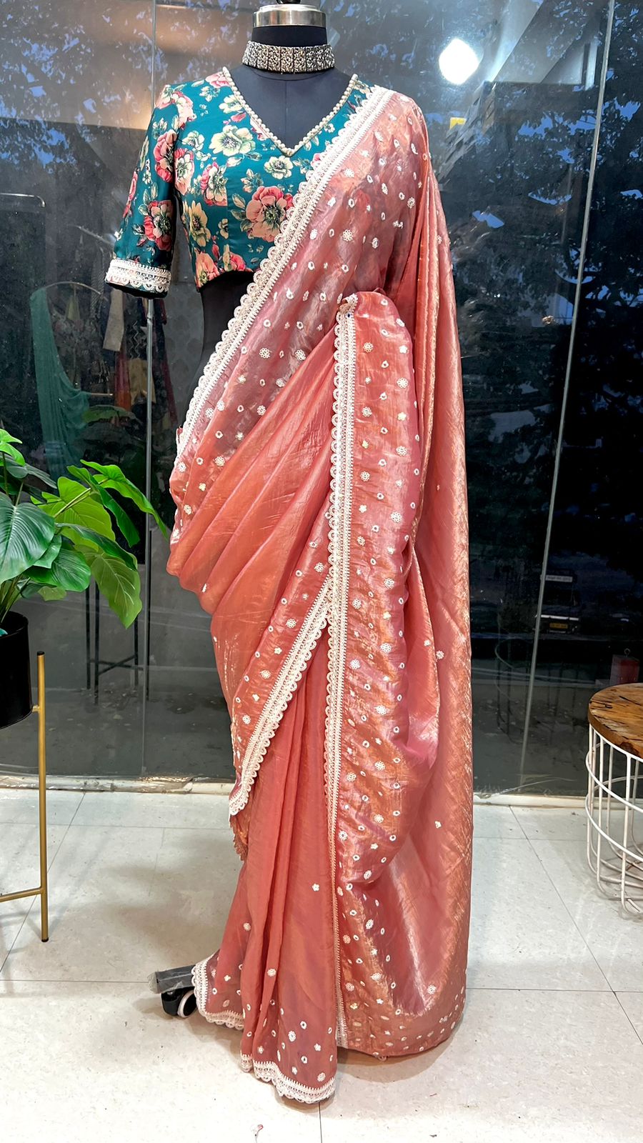 Peach soft glass tissue saree with green floral embroidery blouse