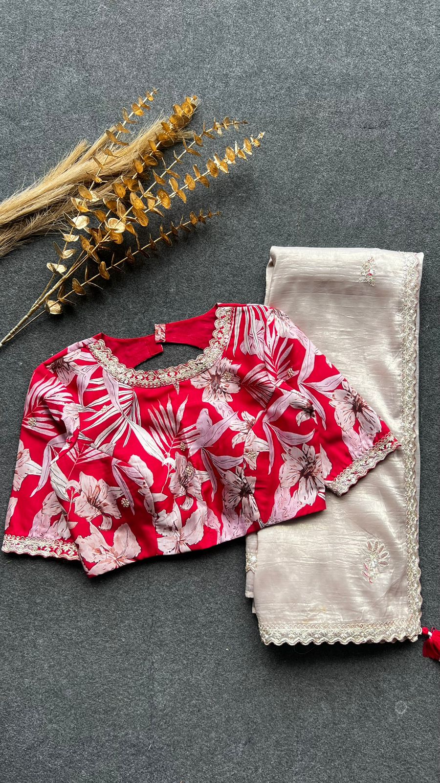 Cream soft glass tissue saree with red floral embroidery blouse