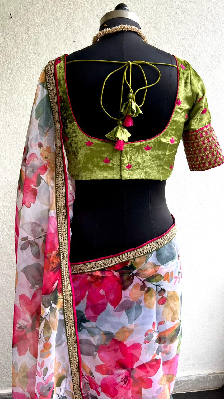 Pink floral organza saree with green velvet embroidered blouse