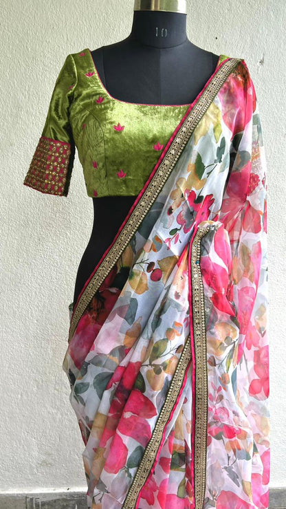 Pink floral organza saree with green velvet embroidered blouse