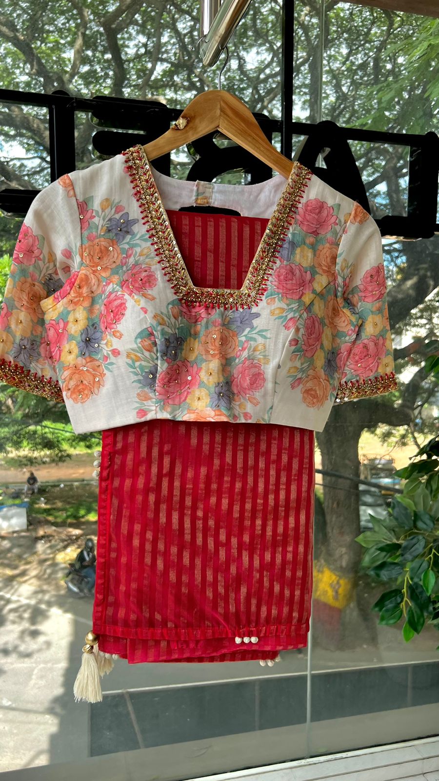 Red stripped tissue saree with white floral hand work blouse