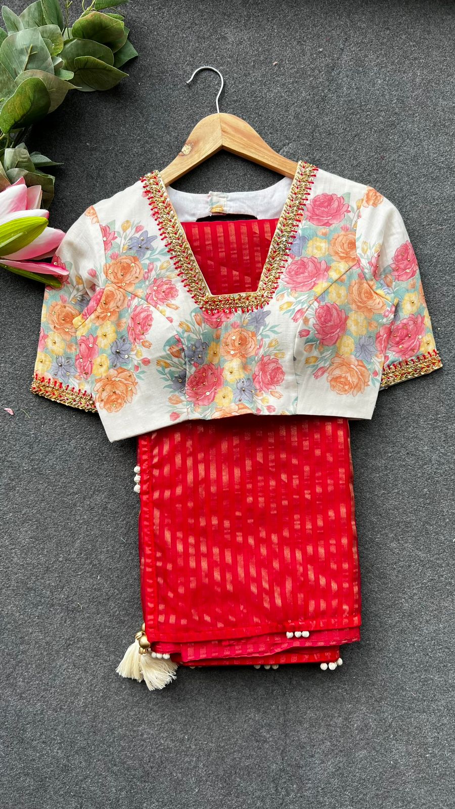 Red stripped tissue saree with white floral hand work blouse