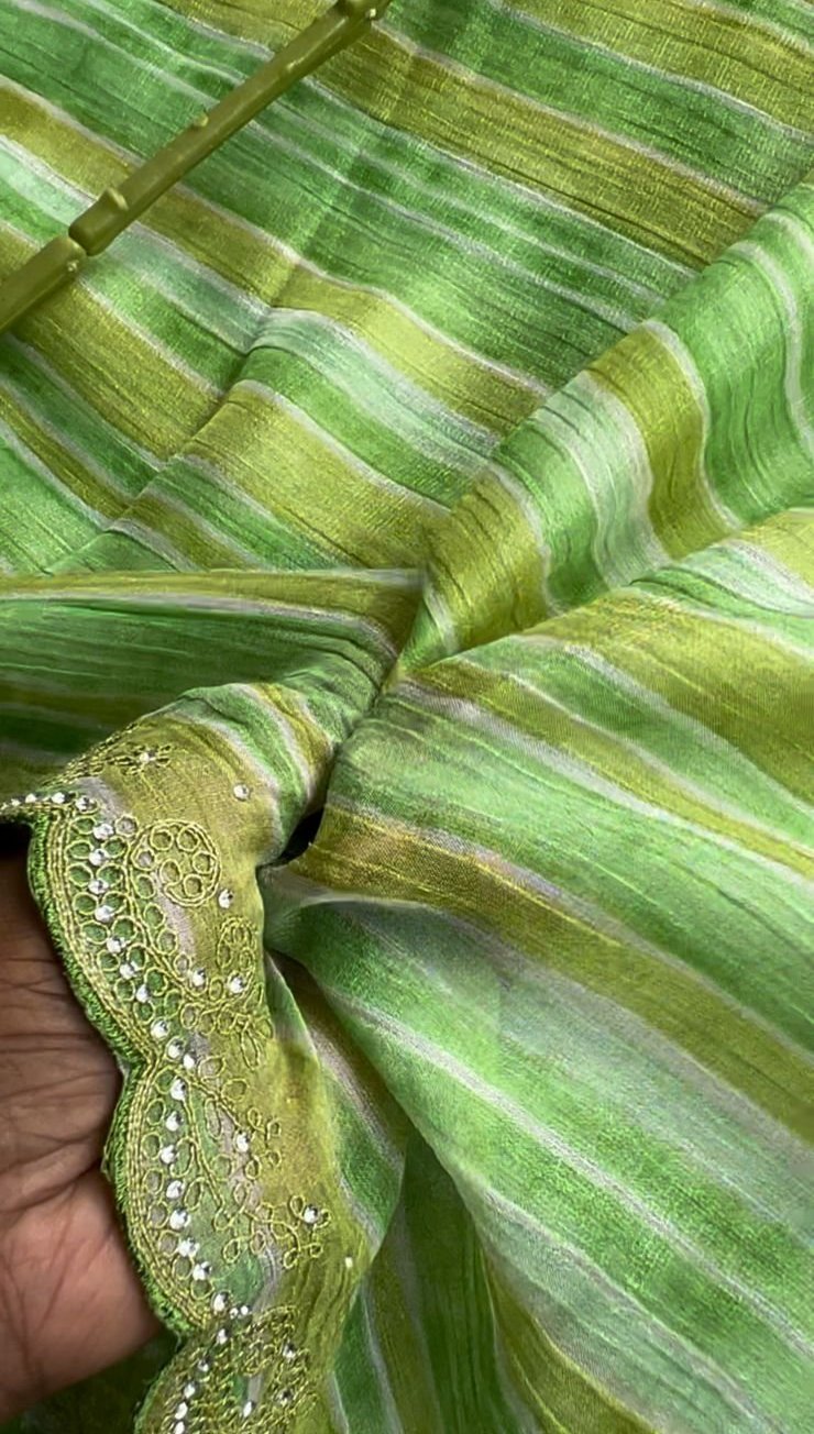 Green chiffon saree with red floral hand work blouse