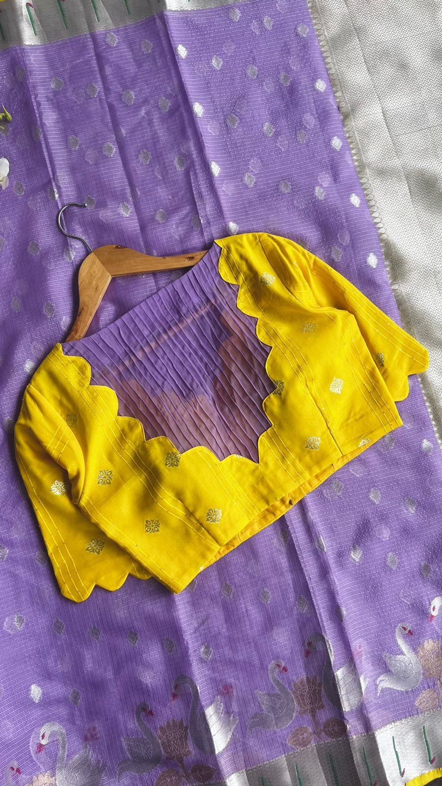 Purple kota embroidery saree with yellow blouse