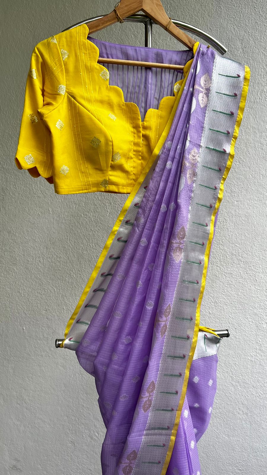 Purple kota embroidery saree with yellow blouse