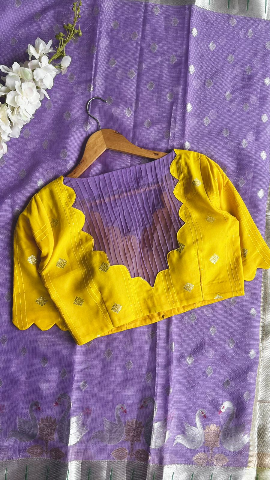 Purple kota embroidery saree with yellow blouse