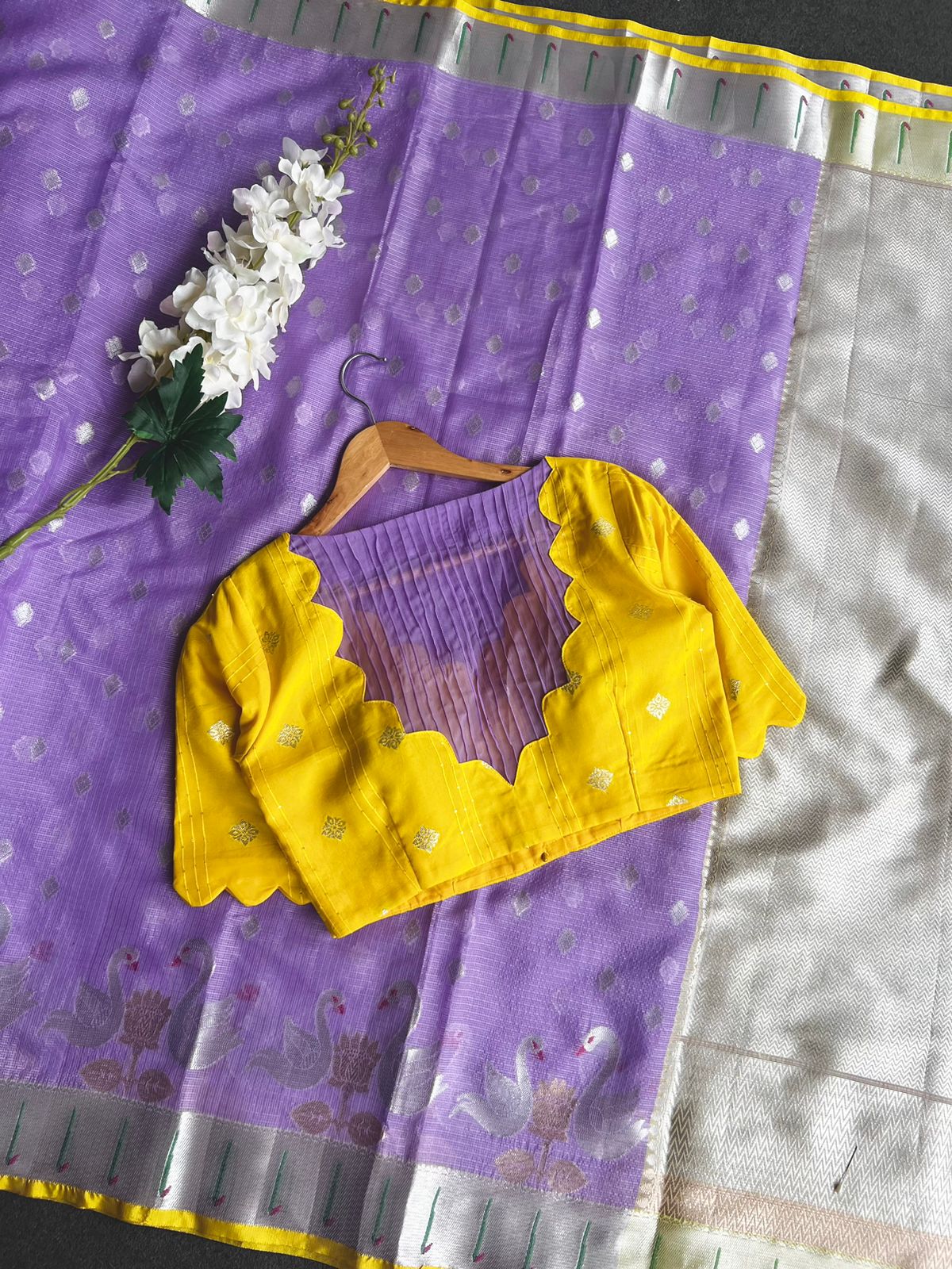 Purple kota embroidery saree with yellow blouse