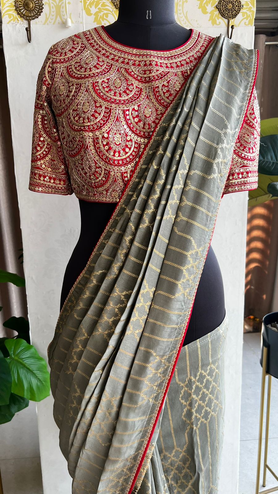 Grey silk saree with red heavy embroidery work blouse