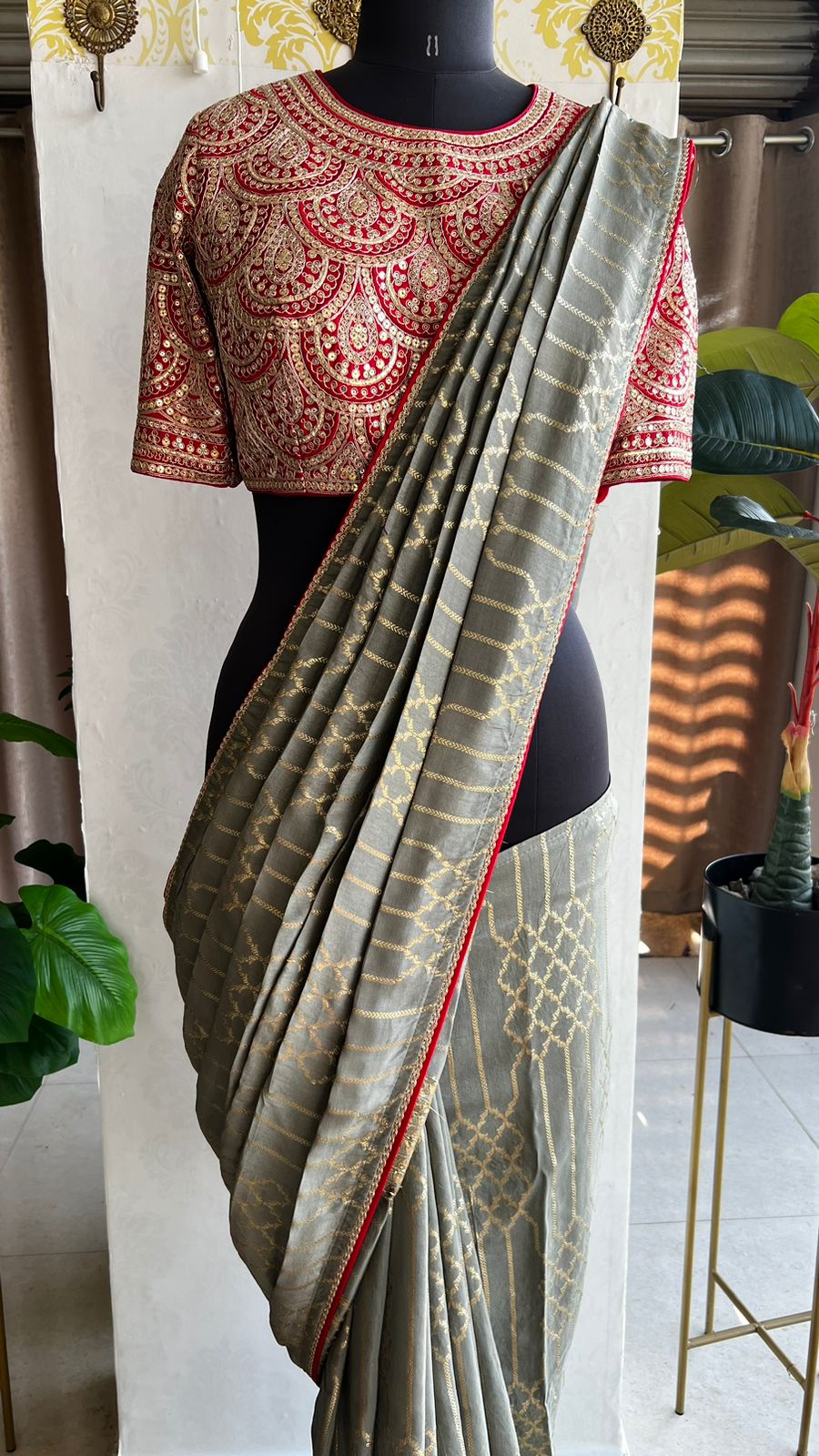 Grey silk saree with red heavy embroidery work blouse